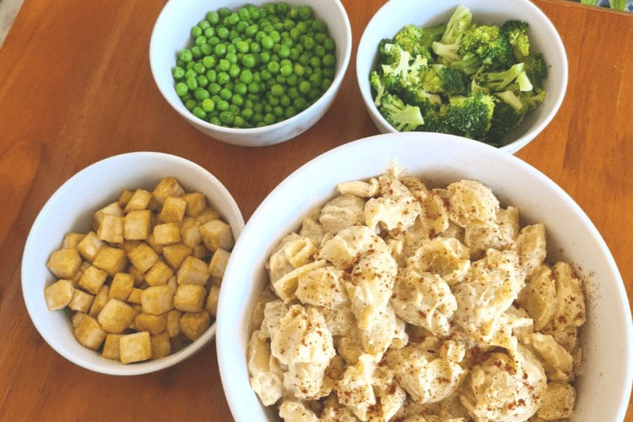 Lunch at Sustainable Play Preschool: Creamy cauliflower pasta shells with broccoli, peas and baked tofu nuggets