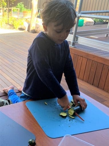 Chopping vegetables sustainable play preschool child care barnsley