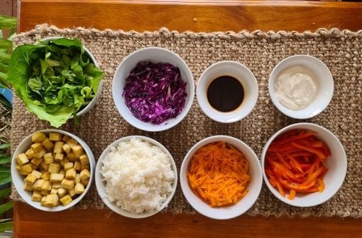 20210608_115934 Lunch: Sushi bowls with marinated tofu, slaw, carrot, lettuce, rice, nori, and vegan mayo