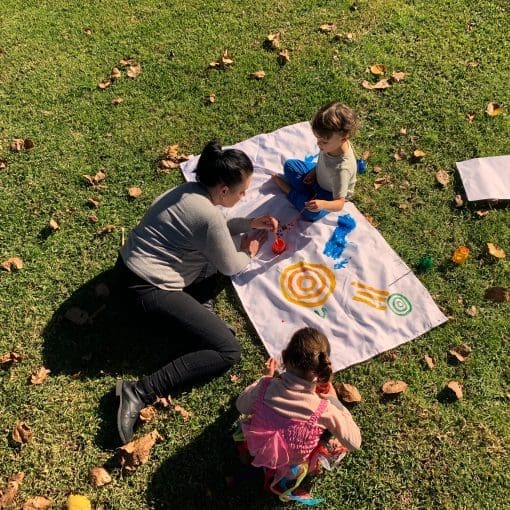 Maximise your CCS hours with sessions outdoor picnic paint on grass