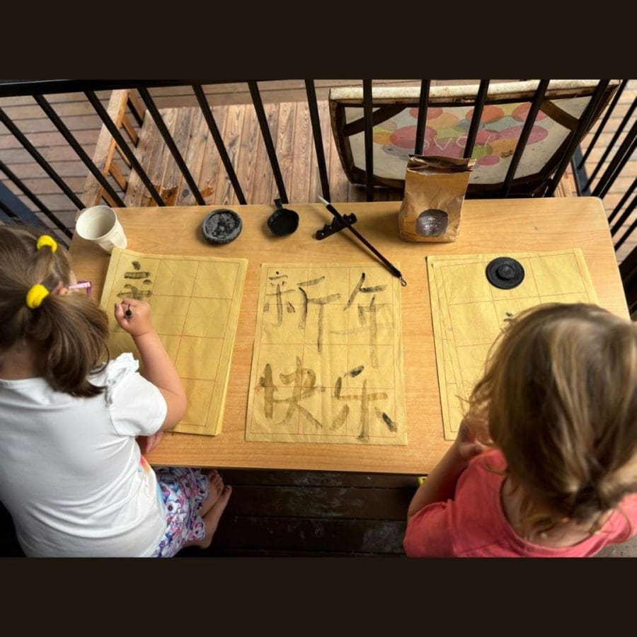 Celebrating the Chinese Lunar Year by practising writing in the traditional Chinese style